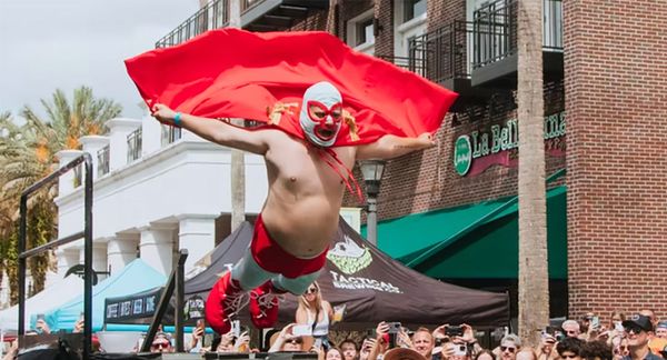 A contestant flops into the pool during Franco's Flop Fest.